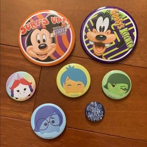 Assortment of Disney buttons